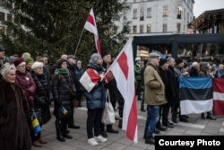 Удзельнікі акцыі ў Стакгольме