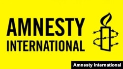 Amnesty International logo in English