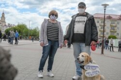 Гаспадары лябрадора Ігар з жонкай