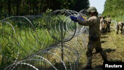 Літоўскія вайскоўцы ўмацоўваюць мяжу зь Беларусьсю. Архіўнае фота