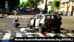 На месцы выбуху аўтамабіля, у якім ехаў Павел Шарамет. Кіеў, 20.07.2016